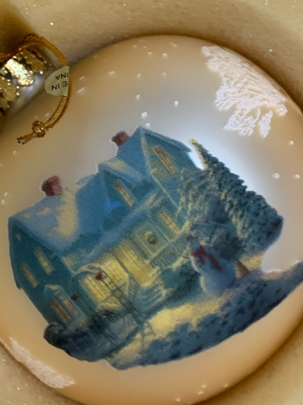 Thomas Kinkade Ivory “Christmas of Blessings” glass Ornament with box.